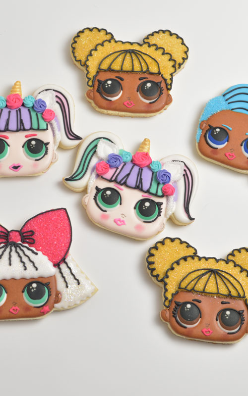 Surprise Doll cookies decorated with royal icing.