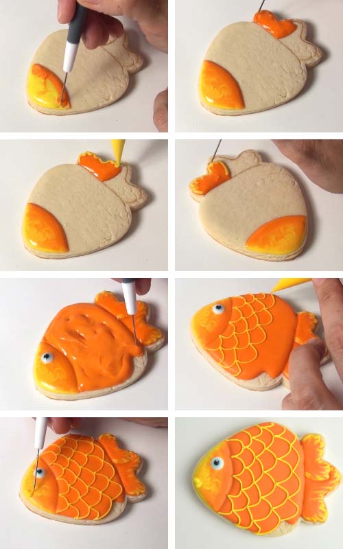 Fish shaped cookie iced with orange icing. Piping scales with icing onto the icing.
