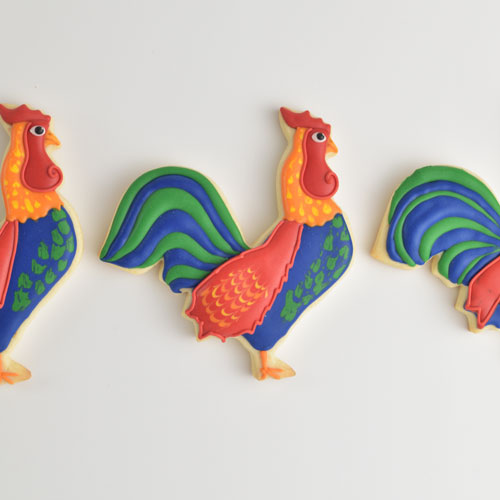 rooster cookies decorated with royal icing