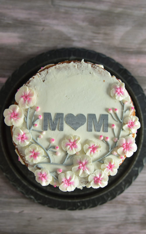 mother's day cake decorated with buttercream cherry blossoms
