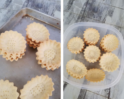 baked mini tart shells in a container