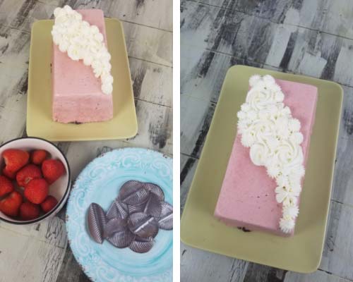 Strawberry Mousse Icebox cake loaf decorated with piped whipped cream swirls