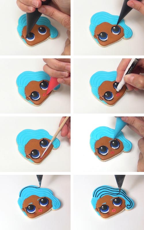 Drawing an nose on royal icing with an edible marker.