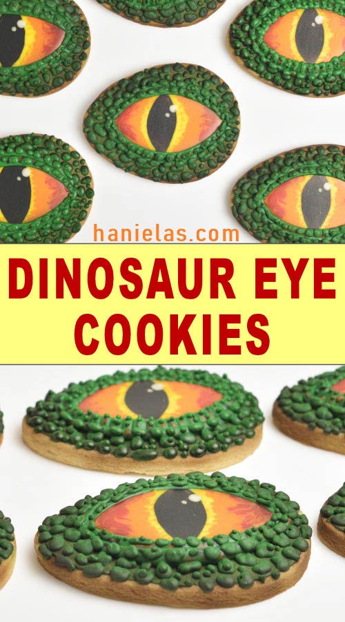Decorated cookies that look like dinosaur eyes on white background.