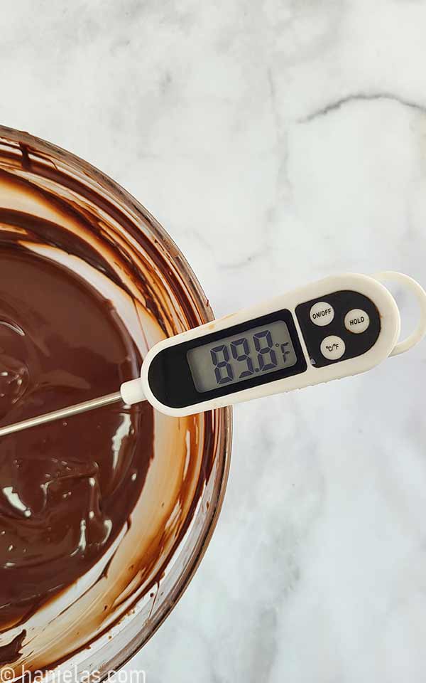 Digital thermometer in the chocolate.