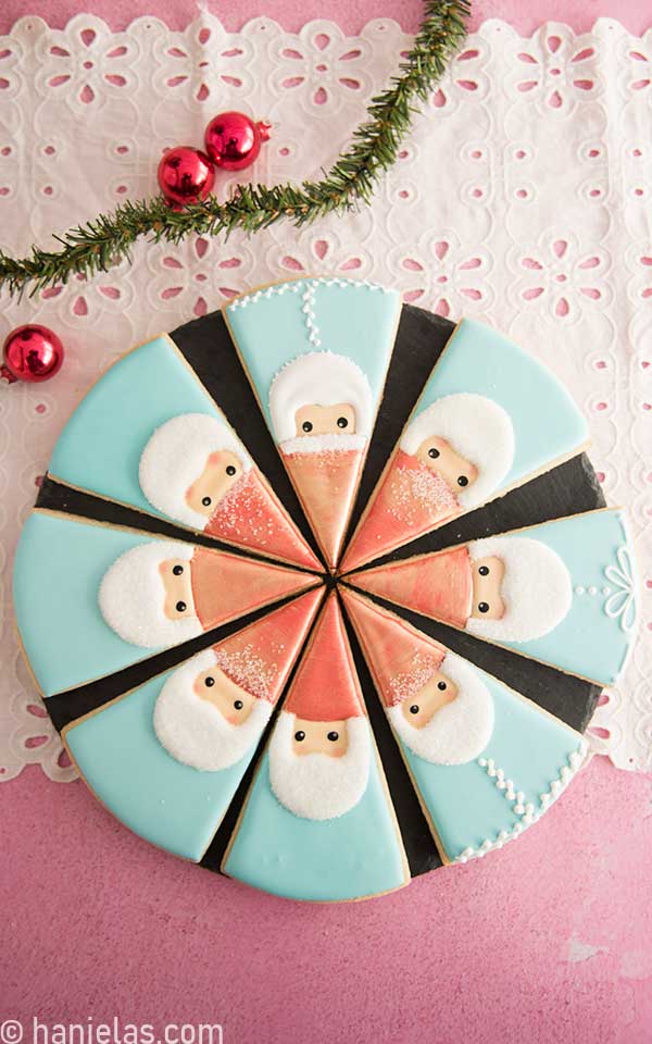 Triangle shaped cookies on a black board.