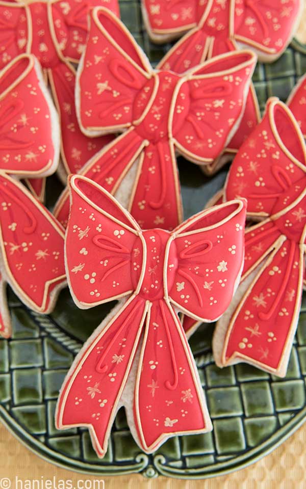 Decorated Cookies on a green plate.