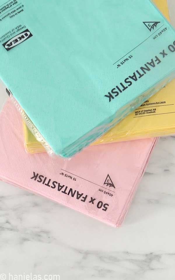Pink, yellow and blue napkins packages.