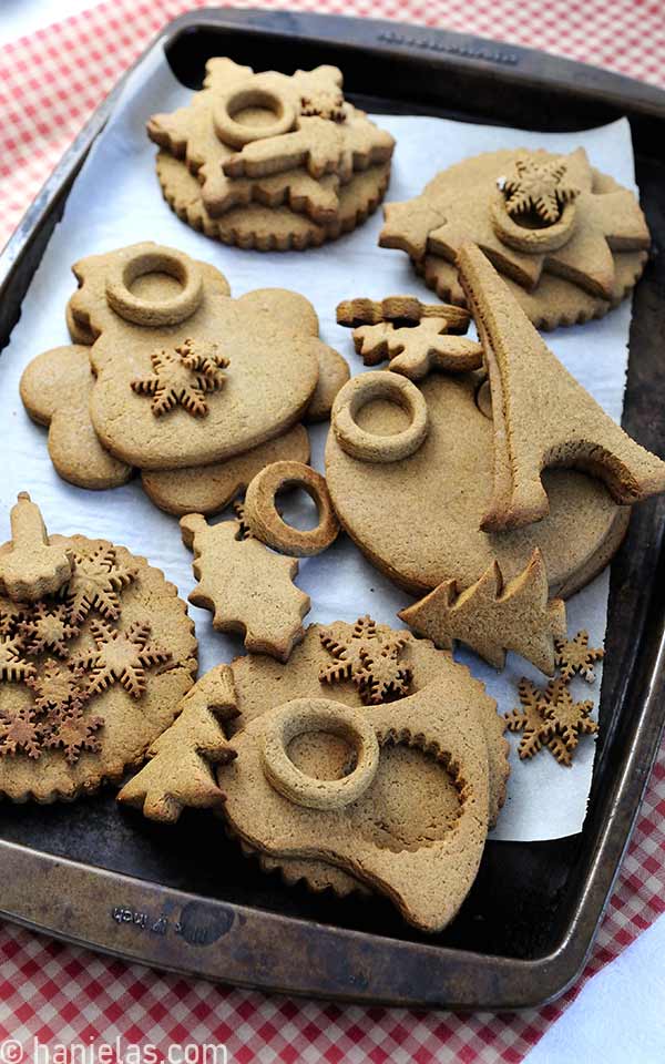 Baked gingerbread cookies on baking sheet.
