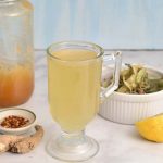 Tea in a glass on a table.