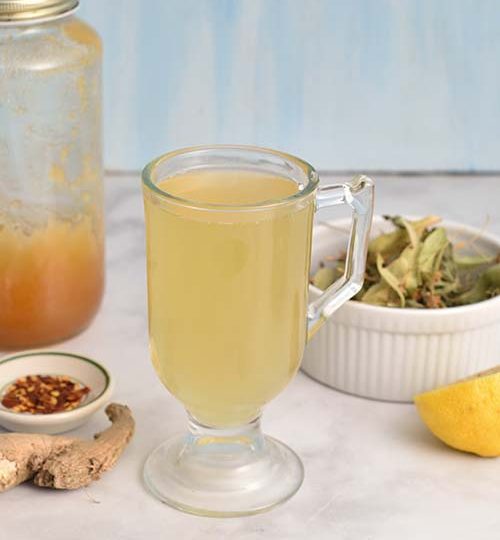 Tea in a glass on a table.