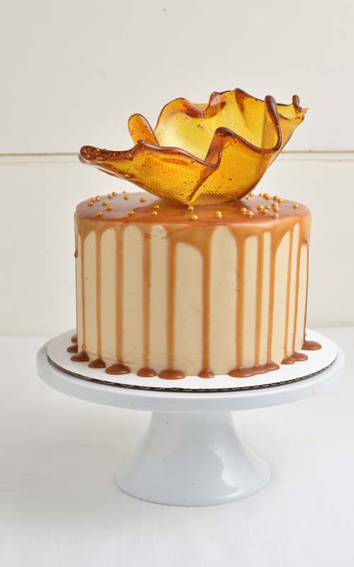 Brown Sugar Cake on a cake stand.