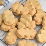 Baked cookies on a cooling rack.