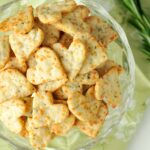 Baked crackers in a glass bowl.