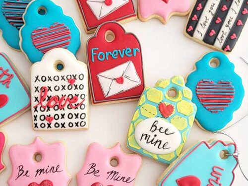 Decorated cookies are displayed on a white background.