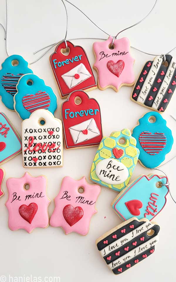 Decorated cookies are displayed on a white background.