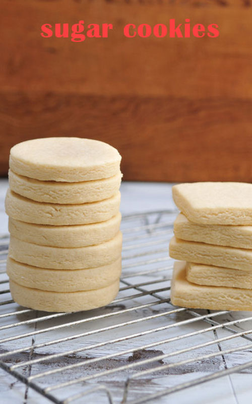 Baked cut out cookies on a cooling rack.