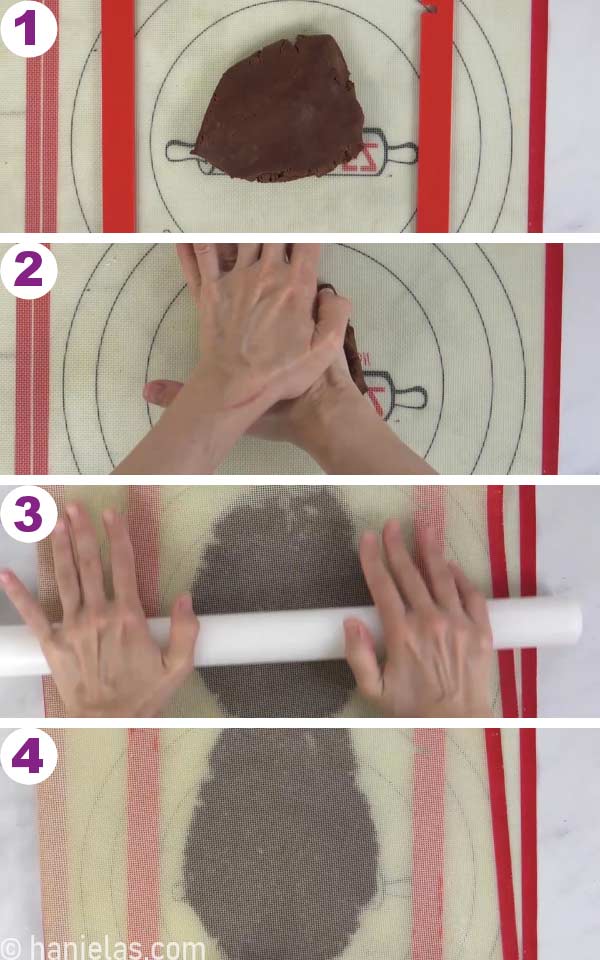 Piece of cookie dough on a silicone mat, hands holding a rolling pin rolling out cookie dough.