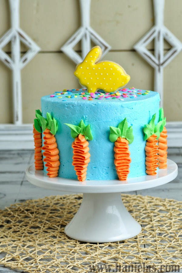 Easter Cake Decorated with Buttercream Carrots and Pretty Bunny Cookie Topper