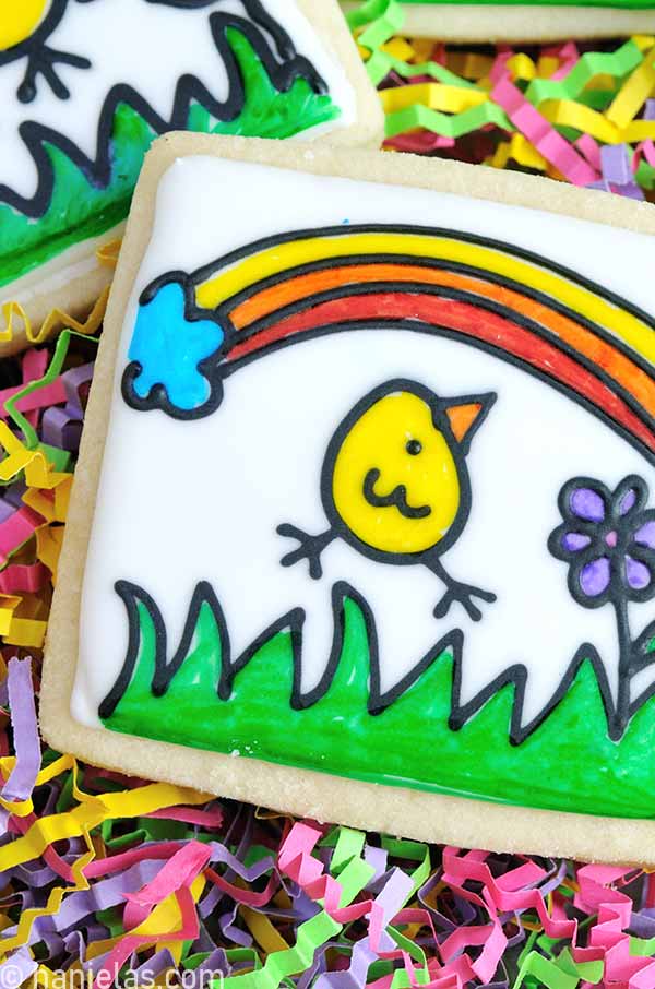 Detail of cookie decorated with royal icing and colored with edible markers.