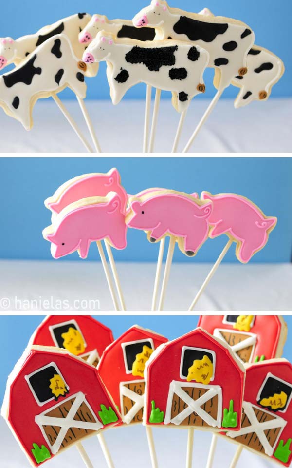 Decorated animal cookies on sticks.