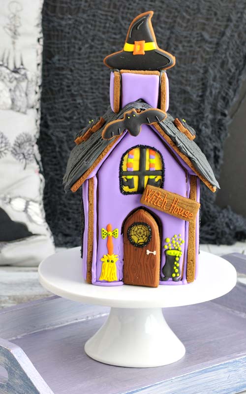 Decorated gingerbread house for halloween.