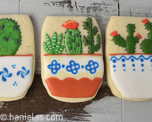 Royal icing decorated cookies with spots.