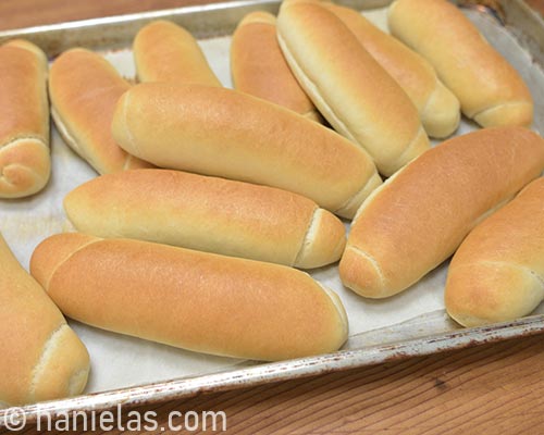 Baked buns on a baking sheet.