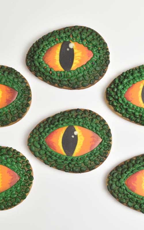 Decorated dragon eye cookies with royal icing.