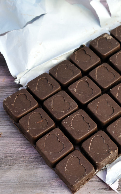 Giant chocolate bar filled wrapped in foil.