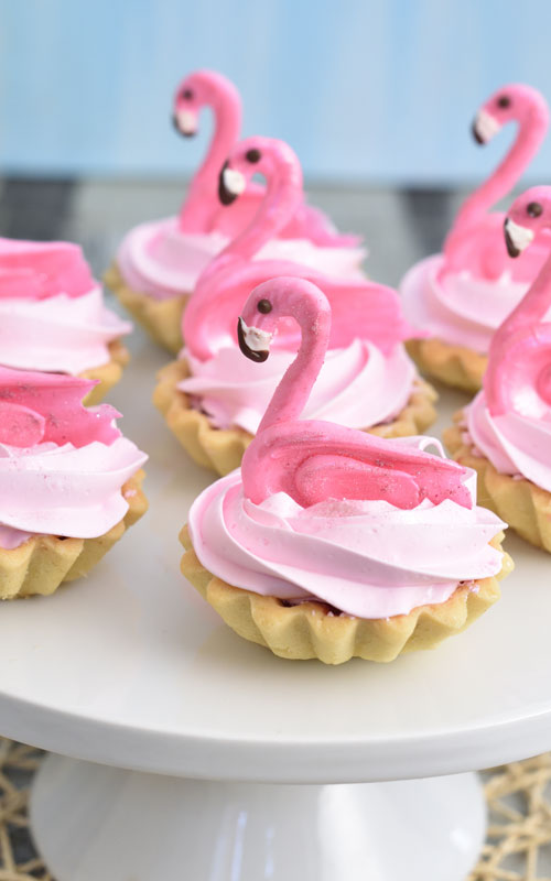 raspberry meringue tarts with raspberry curd pink meringue and chocolate flamingos