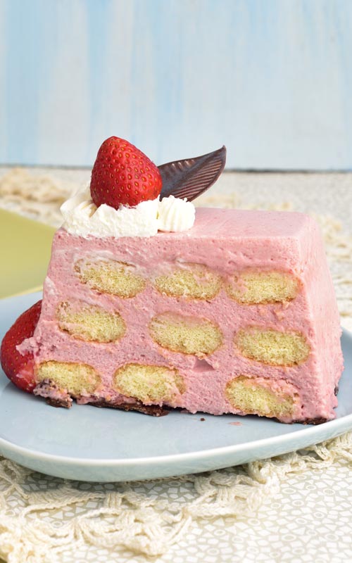 Slice of a strawberry mousse cake.