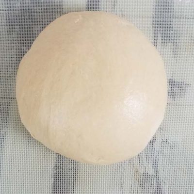 Sweet bread dough shaped into a ball.