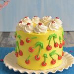 Cake decorated with cherry pattern.