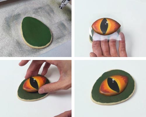 Attaching royal icing eye transfer onto egg shaped cookie iced with green icing.