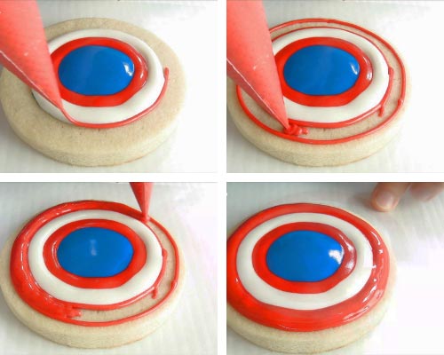 Piping a ring shape with red royal icing.