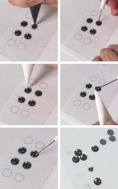 Making black icing onto acetate sheet to make eyes.