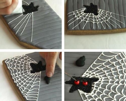 Piping white spider web onto a cookie.