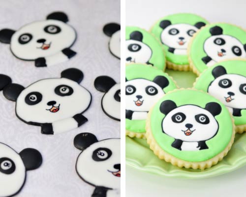 Round cookies decorated with panda royal icing transfers.