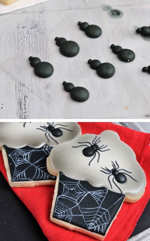 Spidery body piped with black icing on a wax paper.