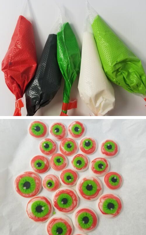 Piping bags filled with royal icing.