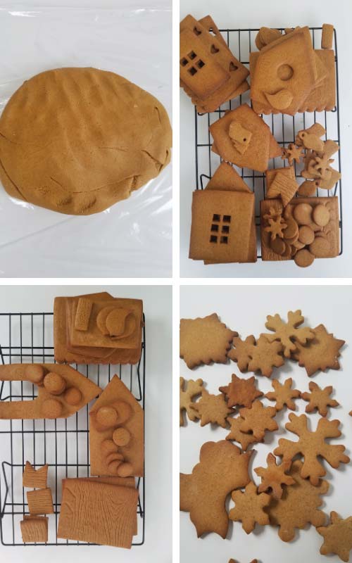 Baked gingerbread house panels layered on a cooling rack.