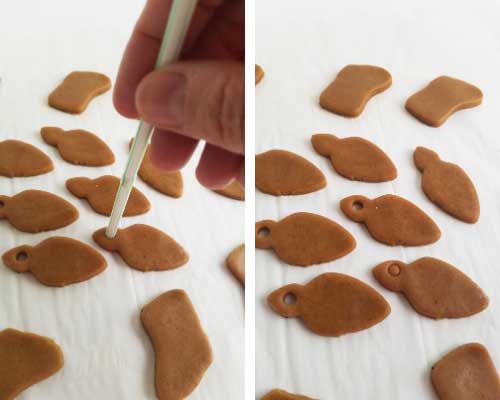 Making a small hole in a cookie with a drinking straw.