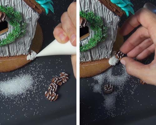 Attaching royal icing pine cone onto a cookie with royal icing.