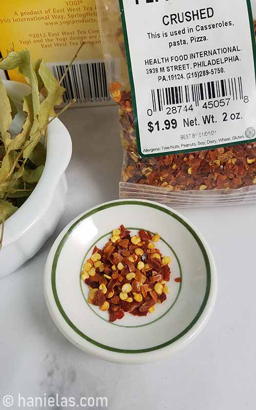 Dry chili flakes on a plate.