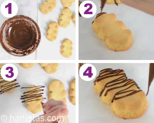 Piping melted chocolate on cookies.