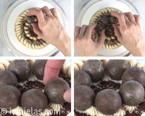 Placing chocolate spheres on the top of the cake.