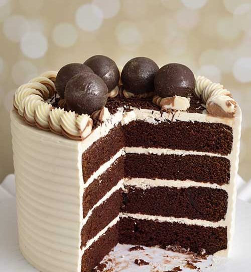 Cut cake showing cake layers.