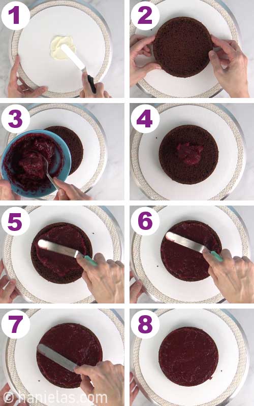 Spreading raspberry filling onto a cake.