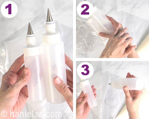 Hand holding icing bottles.